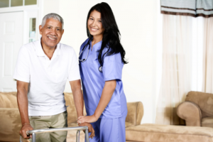 senior and caregiver smiling